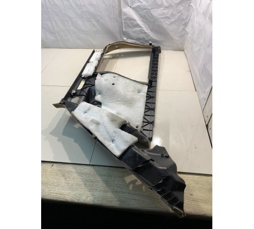 Обшивка багажника (левая)