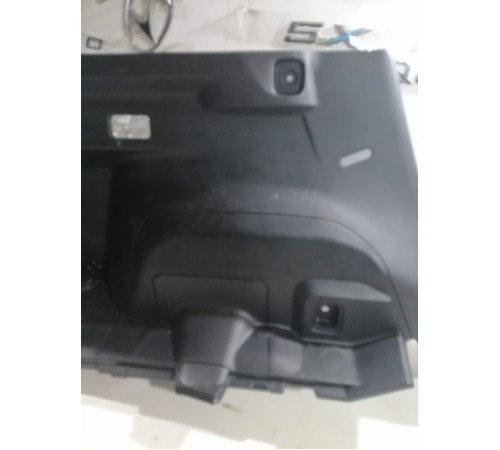 Обшивка багажника (левая)