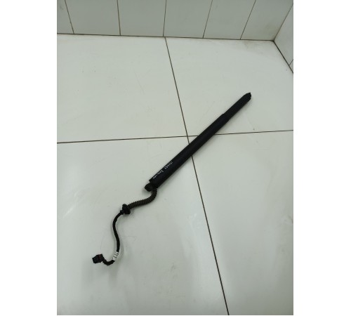 Амортизатор двери крышки багажника левый