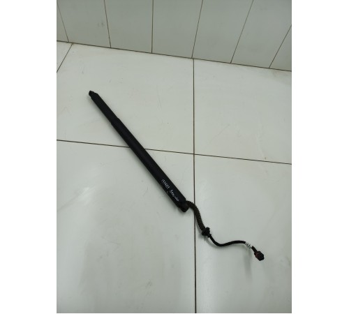 Амортизатор двери крышки багажника левый