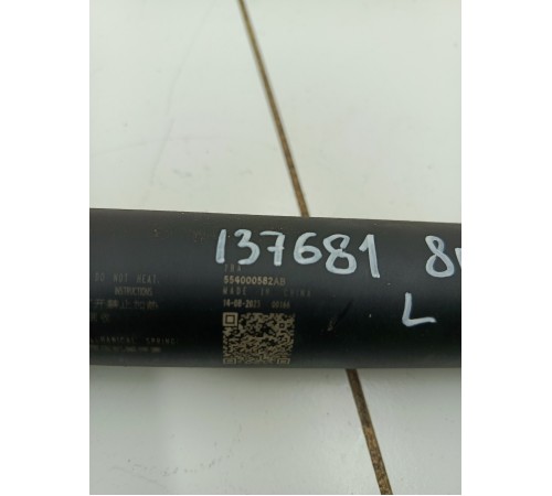 Амортизатор двери крышки багажника левый