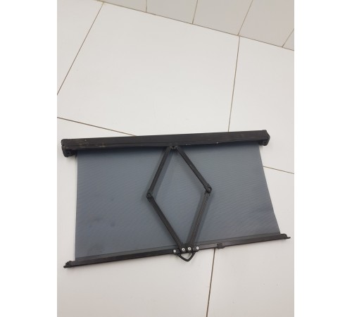 Шторка кабины солнцезащитная левая