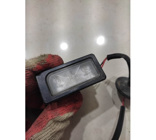 Фонарь подсветки номера правый