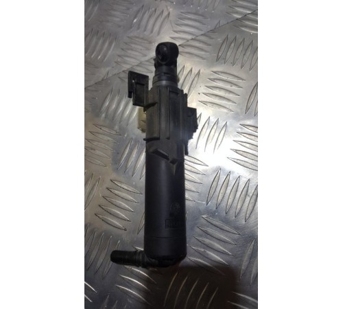 Форсунка омывателя фар перед. лев.