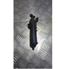 Форсунка омывателя фар перед. лев.