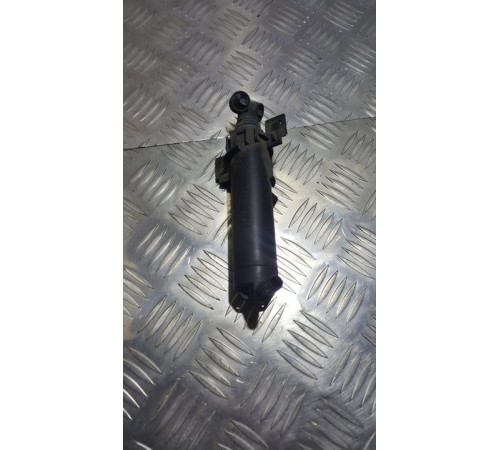 Форсунка омывателя фар перед. лев.