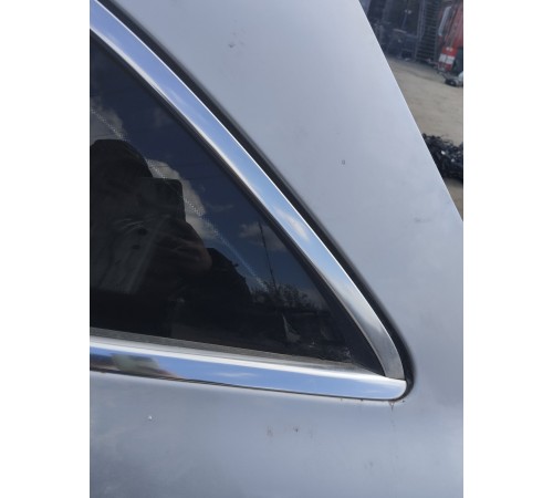 Глухое стекло заднее левое