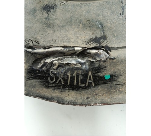 Кулак поворотный передний левый