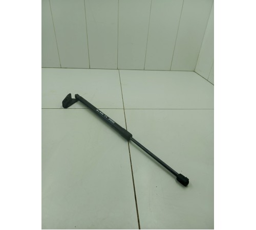 Амортизатор крышки двери багажника левый