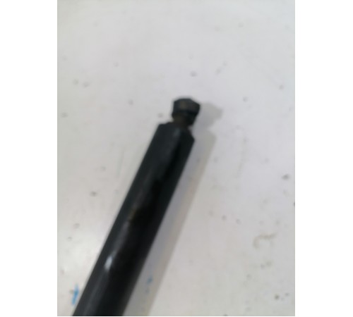 Амортизатор крышки багажника левый