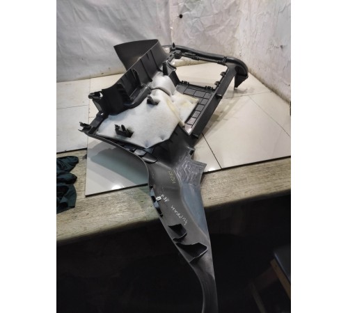 Обшивка багажника (левая)