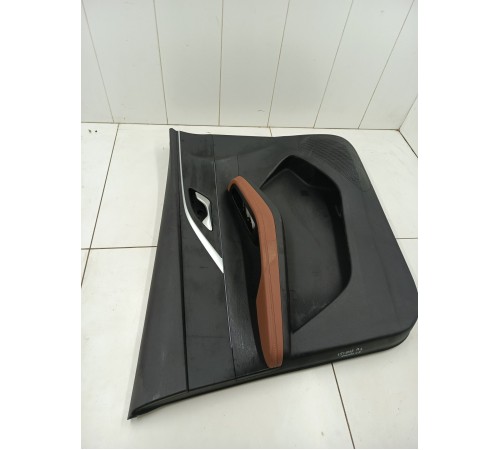 Обшивка двери передняя левая