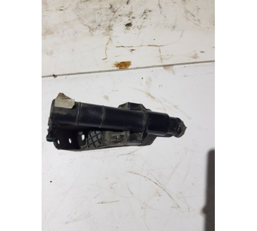 Форсунка омывателя фар перед.