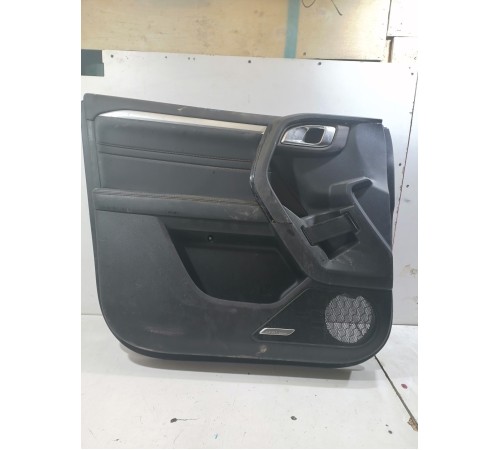 Обшивка двери передняя левая