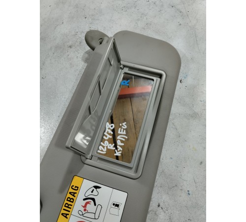 Козырёк солнцезащитный правый