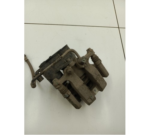 Суппорт тормозной задний левый