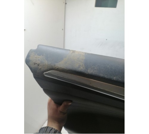 Обшивка двери передняя левая