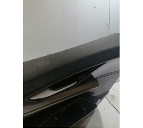 Обшивка двери передняя левая