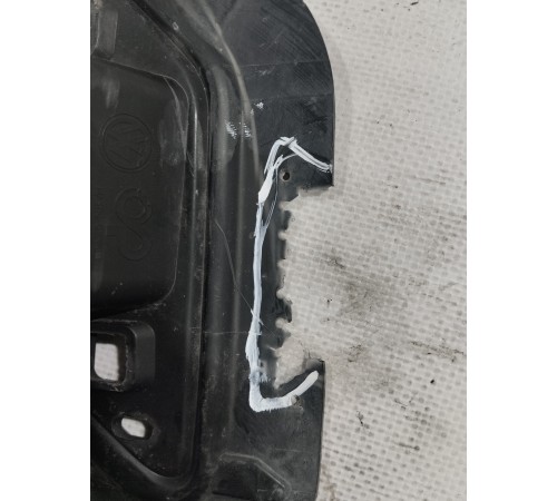 Кронштейн форсунки омывателя фары левый