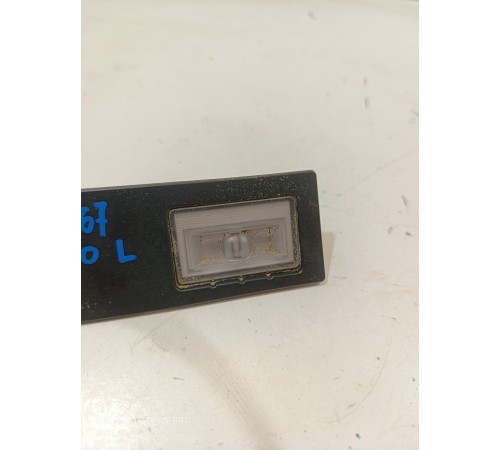 Фонарь подсветки номера левый