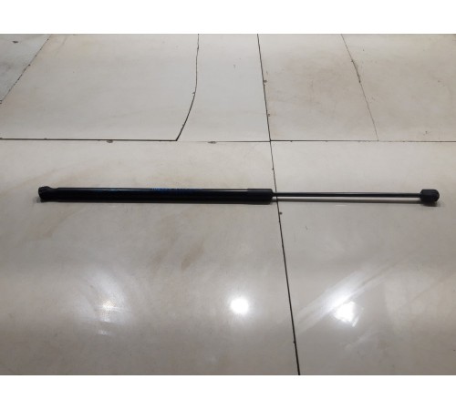 Амортизатор капота левый