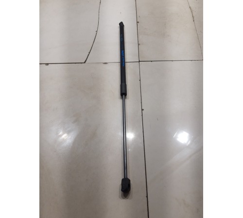 Амортизатор капота левый