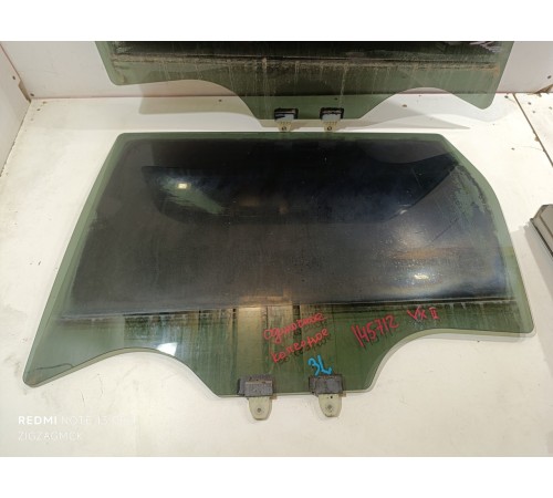 Стекло двери заднее левое