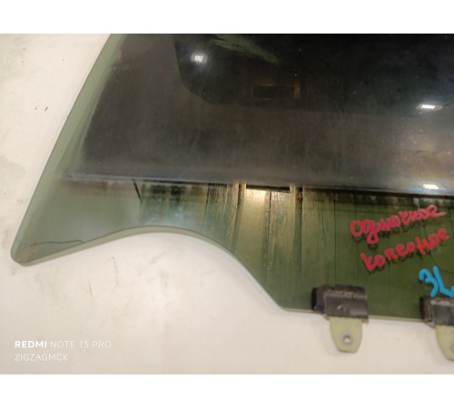 Стекло двери заднее левое