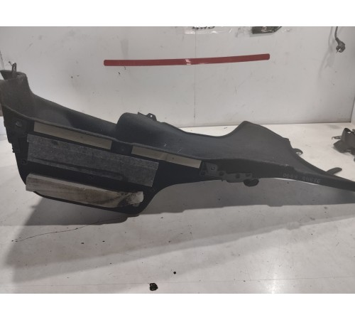 Обшивка багажника левая