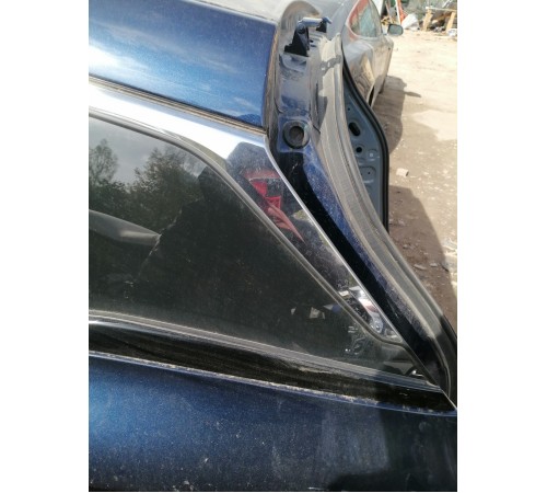 Стекло кузовное глухое заднее левое