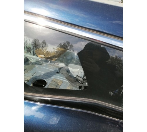 Стекло кузовное глухое заднее левое