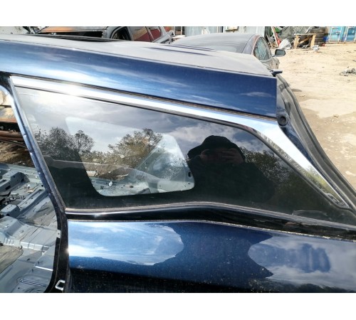 Стекло кузовное глухое заднее левое