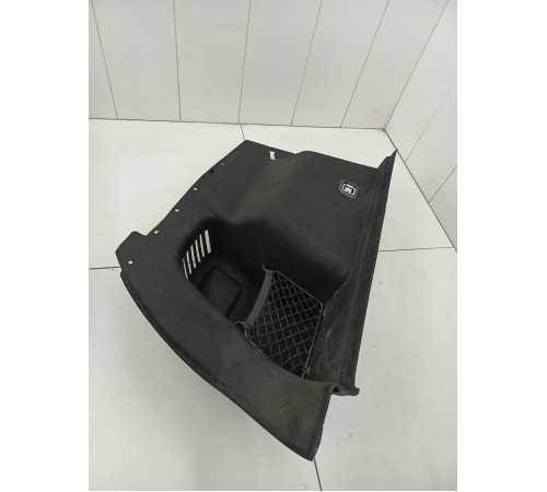 Обшивка багажника левая