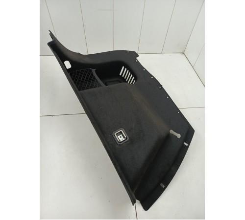 Обшивка багажника левая