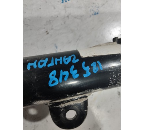 Стойка амортизатора передняя левая