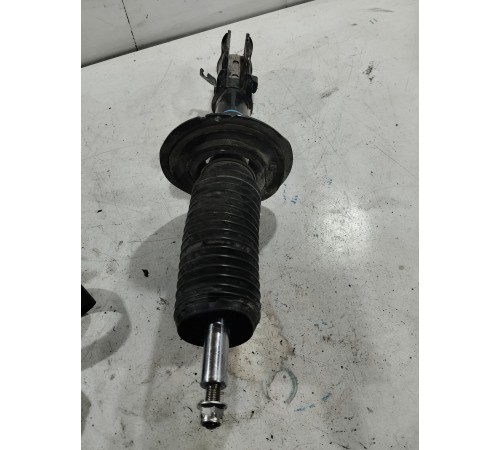 Стойка амортизатора передняя левая