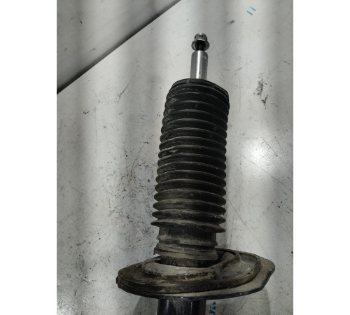 Стойка амортизатора передняя левая