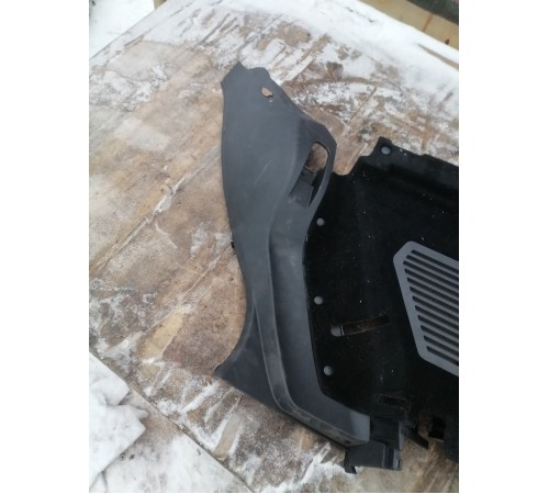 Обшивка багажника левая