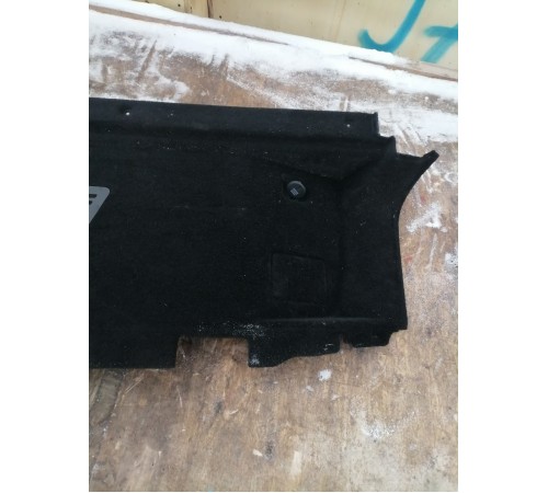 Обшивка багажника левая