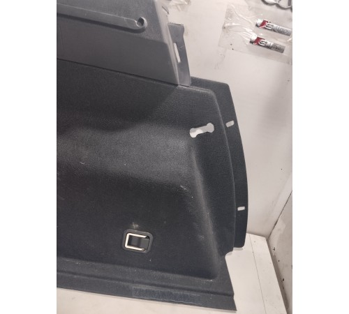 Обшивка багажника левая