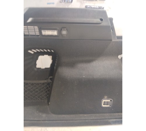 Обшивка багажника левая