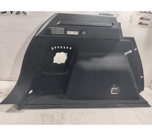 Обшивка багажника левая