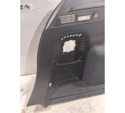 Обшивка багажника левая