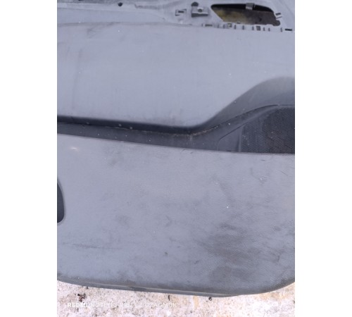 Обшивка двери передняя левая