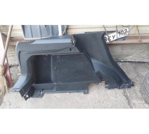 Обшивка багажника левая