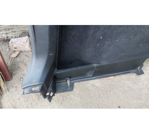 Обшивка багажника левая