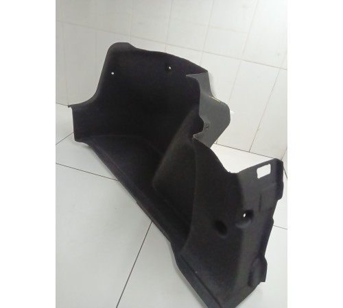 Обшивка багажника левая