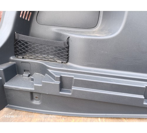 Обшивка багажника левая