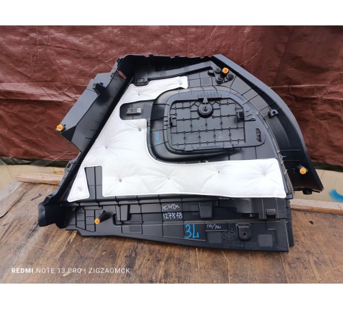 Обшивка багажника левая