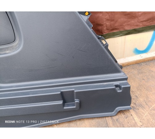 Обшивка багажника левая